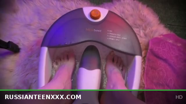 teen femboy washes her smooth legs in a massage bath and smears them with cream